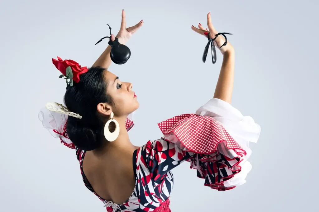 Flamenco dancer in beautiful dress in Spain.