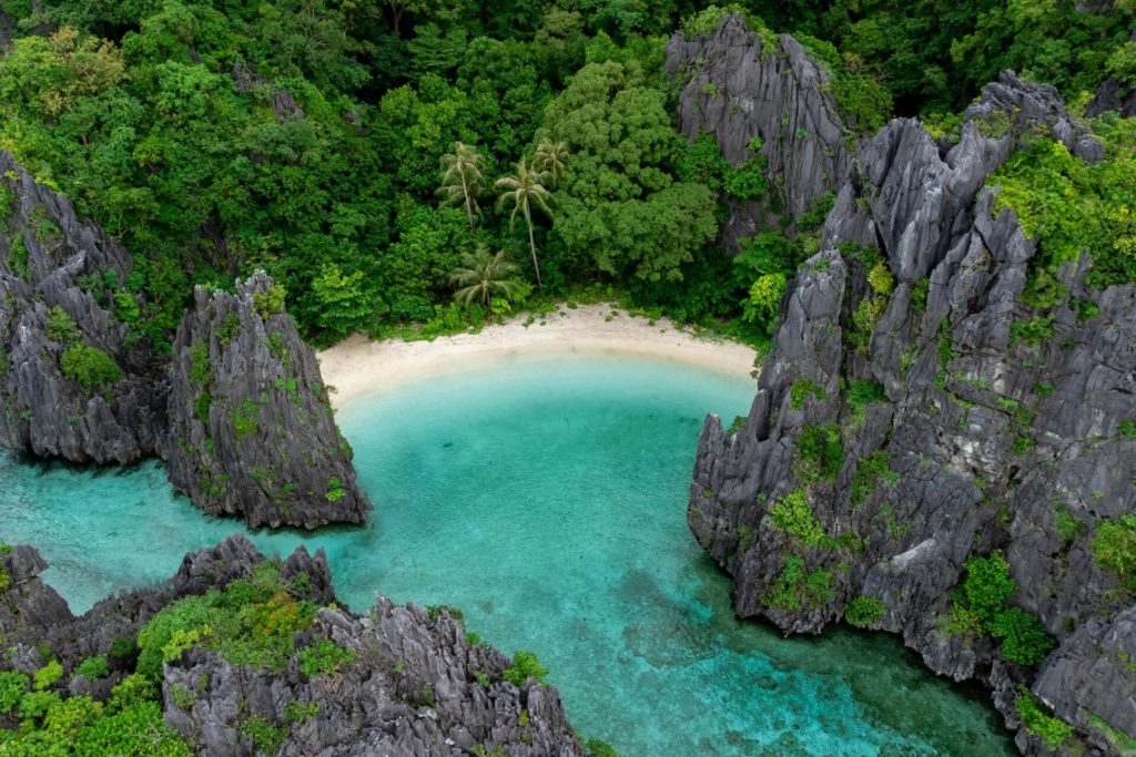 Incredible secret beach near El Nido, Palawan, with crystal-clear waters